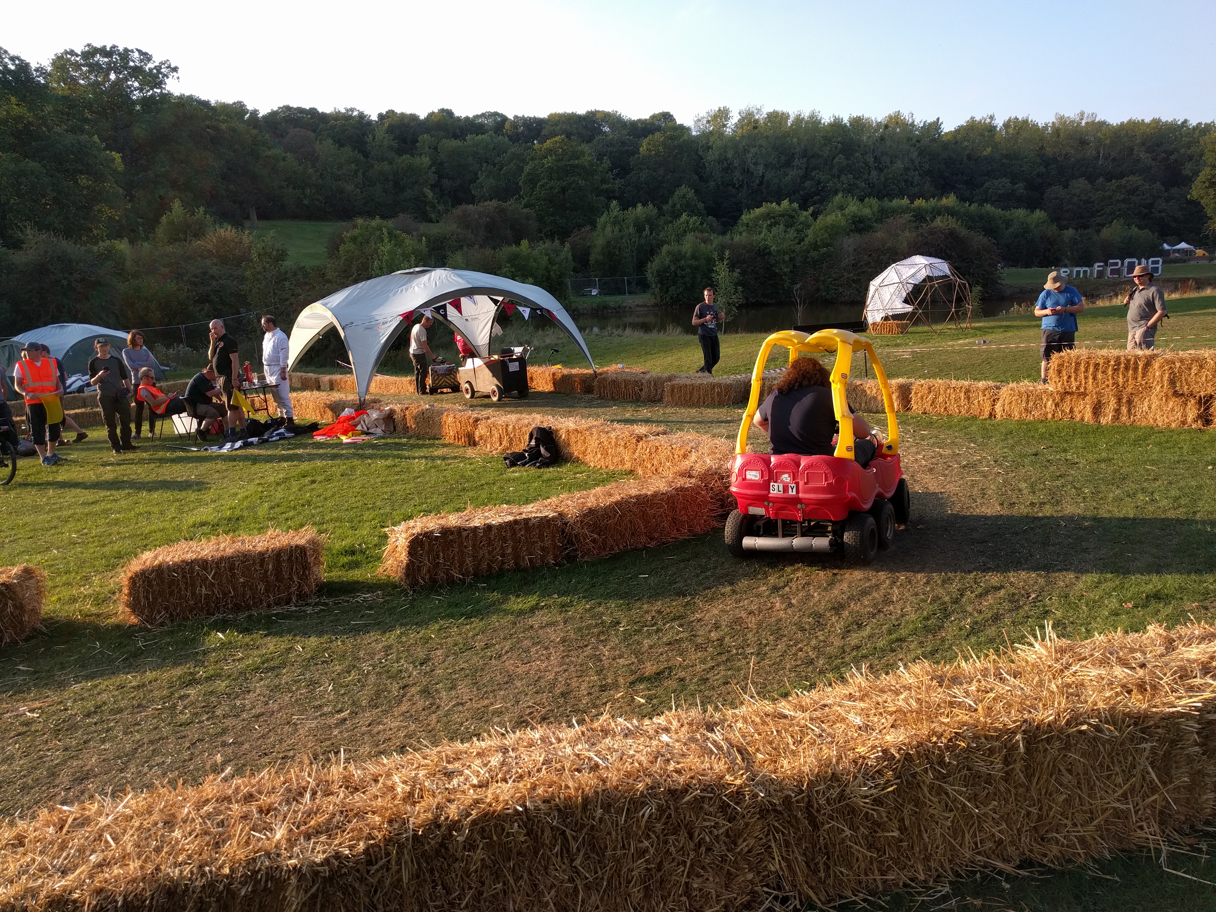 Hacky Races Child's toy car hacked to fit an adult