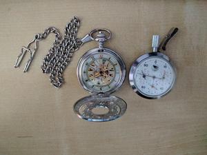 Left: Wind up pocket watch, Right: Mechanical pedometer